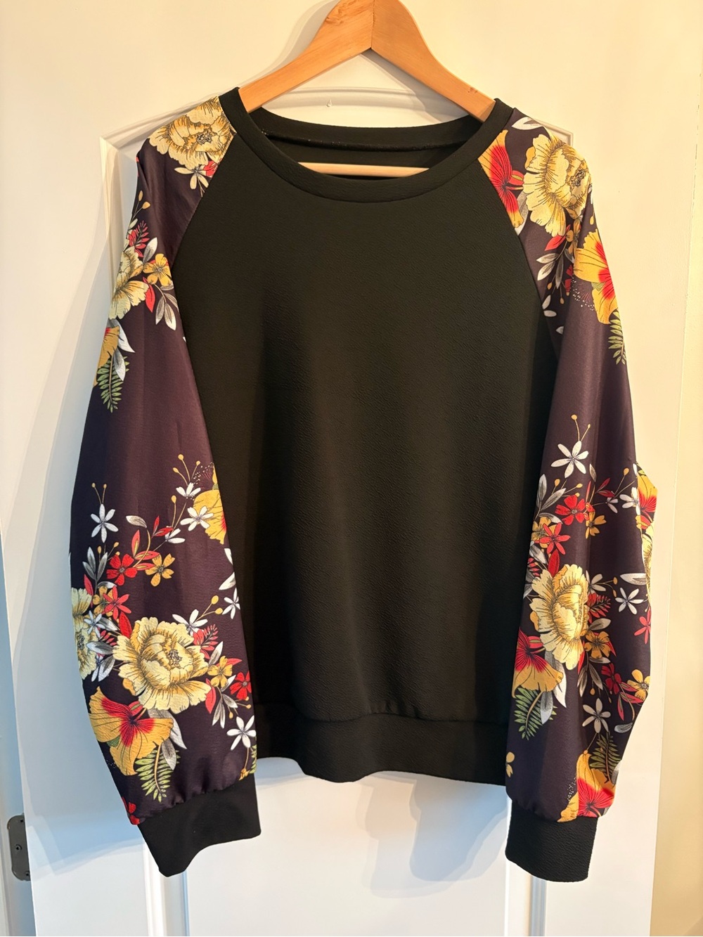 Black Sweatshirt with Floral Print Sleeves